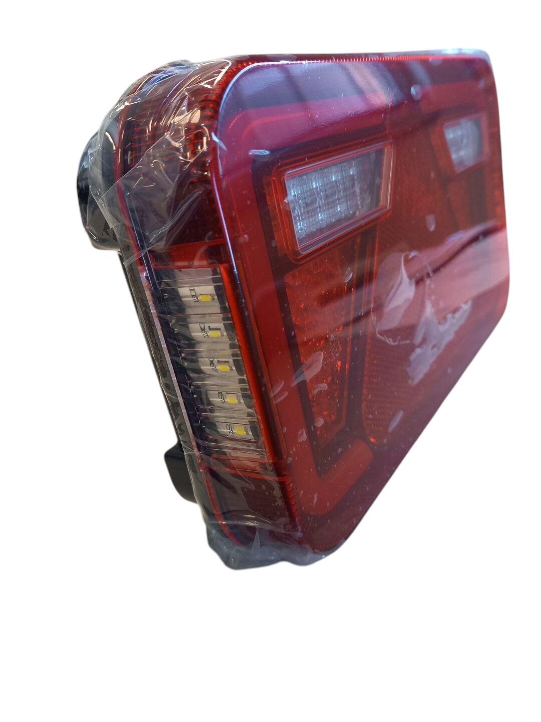 ASPOCK tail lamp MULTILED IV right / reverse / with plate light / 5-PIN byonet / 12/24V